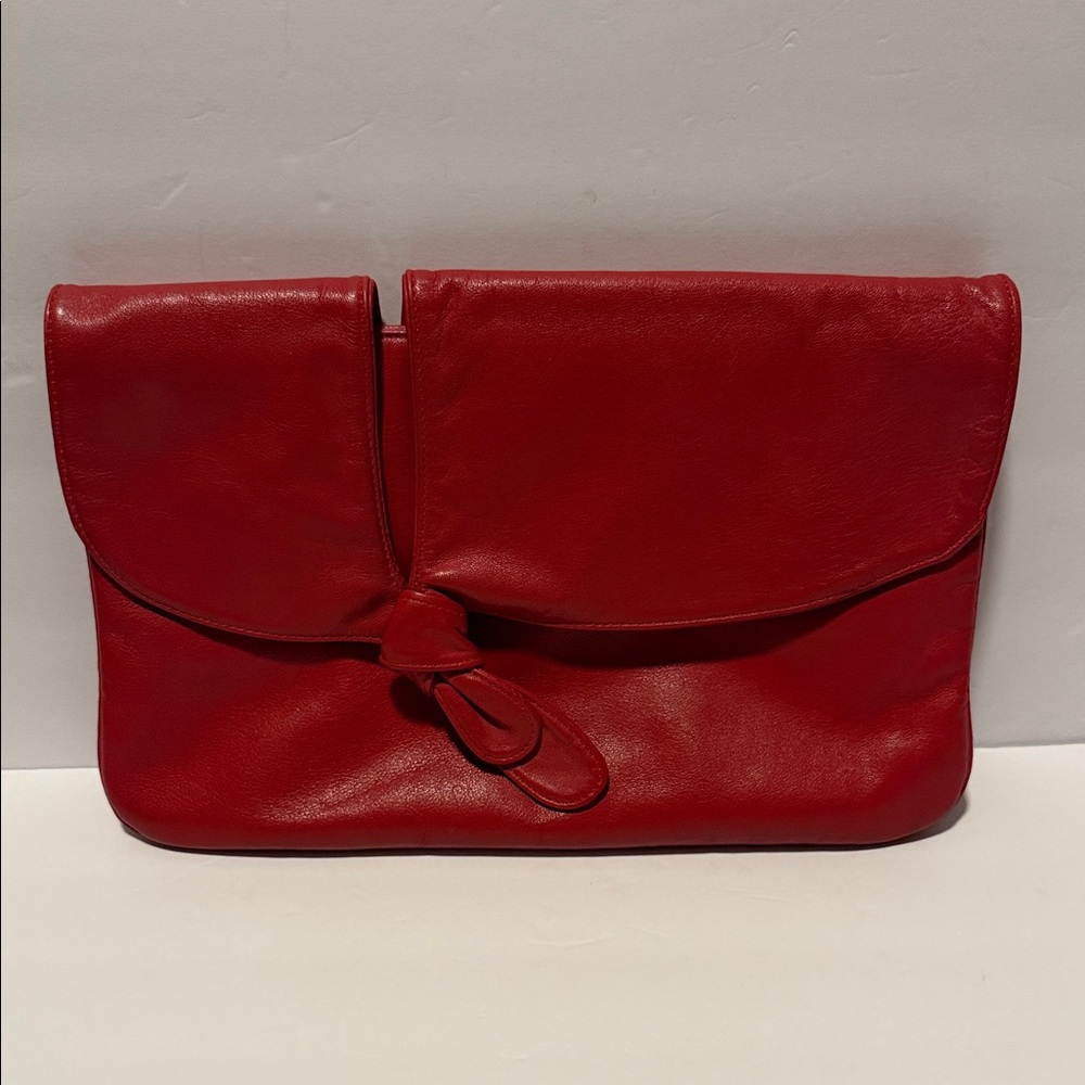 18.  Chic Red Leather Clutch.